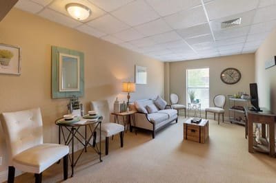 A cozy interior living room setting with furniture