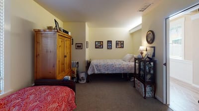 Cozy resident room with furniture and personal items