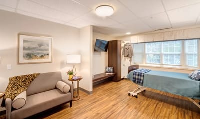 Cozy private resident room with furniture and window light