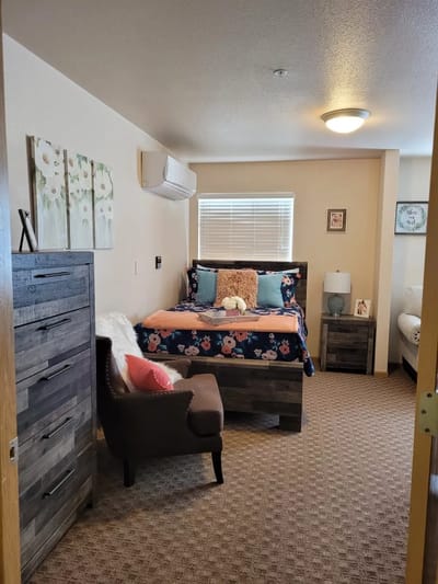 Cozy senior living bedroom with decorations and furniture