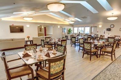 Dining room with tables set for meals