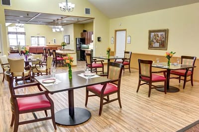 Dining area with tables set for a meal
