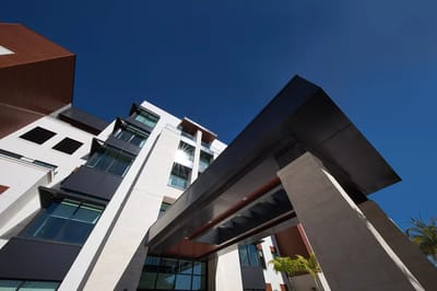 Modern building entrance with blue sky
