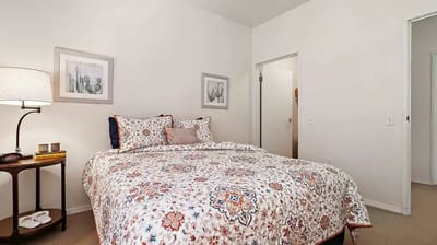 Cozy private bedroom with floral bedding