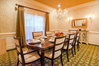 Dining room set for a meal with elegant decor