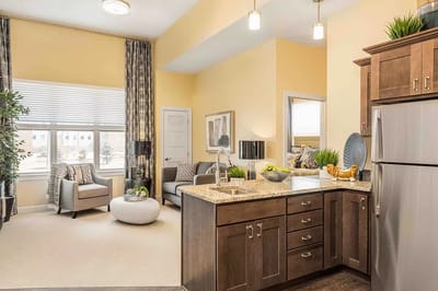 Bright interior view of a living area with kitchen