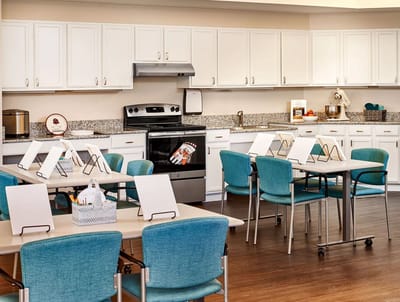 Interior view of a dining area with tables and chairs