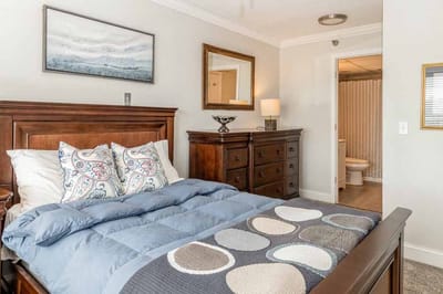 Cozy private resident room with a bed and dresser