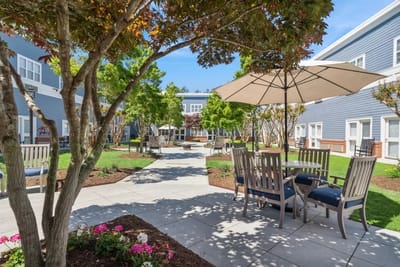 Outdoor courtyard with seating and umbrellas