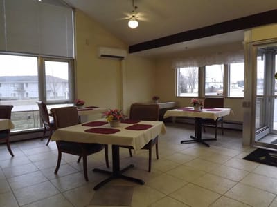 Dining area with tables and flowers