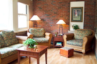Cozy living room area with floral furniture