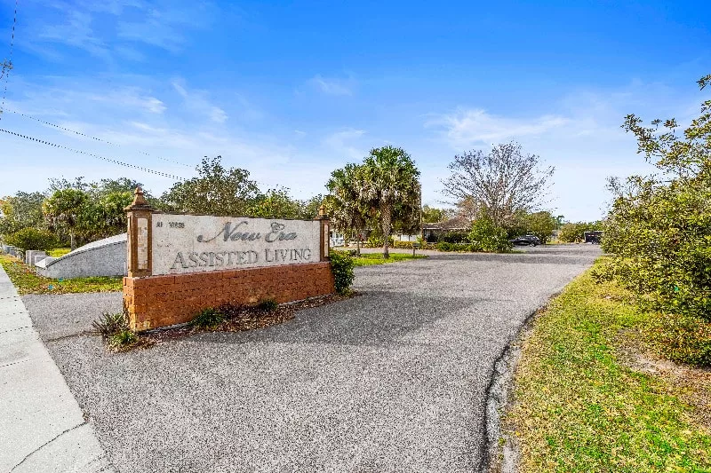 Entrance sign of New Era Assisted Living