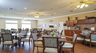 Bright dining area with tables set for meals