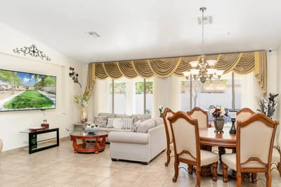 Interior view of a cozy common area with seating and decor