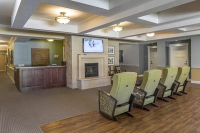 Common area with seating and a television