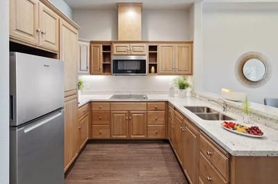 Modern kitchen with fruits on the counter