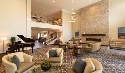 Bright, spacious interior lobby with seating and decor