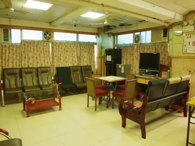Common area with seating and television