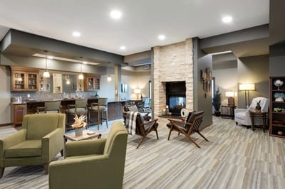 Common area with seating and a fireplace