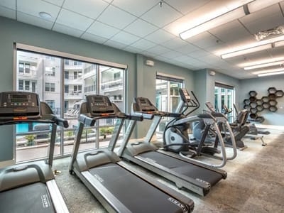 Interior view of an exercise room with fitness equipment
