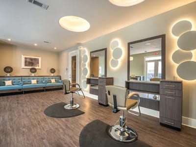 Salon area with modern styling stations and mirrors