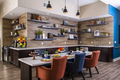 Bright dining area with food and colorful seating