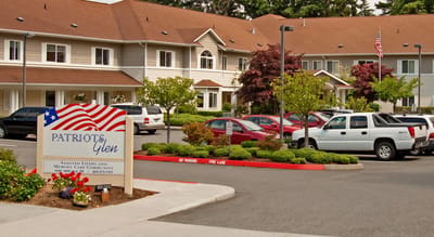 Exterior view of Patriots Glen facility with landscaped gardens