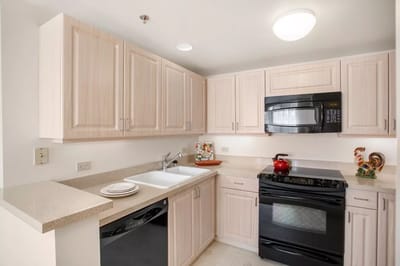 Bright kitchen area with modern appliances