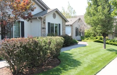 Exterior view of the facility with landscaped garden