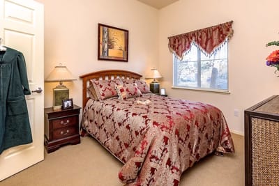 A cozy private bedroom in assisted living
