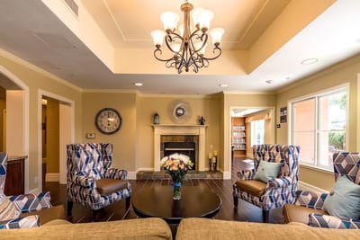 Cozy common area with seating and a fireplace