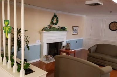Cozy common area with seating and fireplace