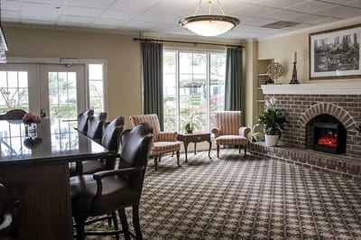 Cozy common area with seating and fireplace