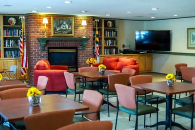 Common area with seating and bookshelves