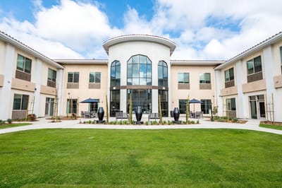 Exterior view of Park View Estates with outdoor seating area