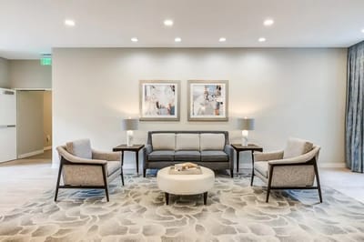 Modern common area with seating and artwork