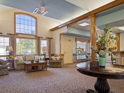 Common area with comfortable seating and floral decor