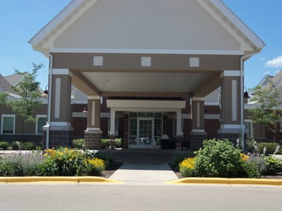 Front entrance of Parkview Health Center with flowers