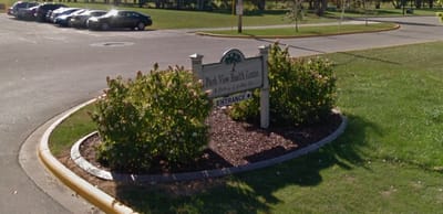 Sign for Park View Health Center with landscaping