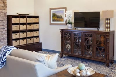 Bright common area with comfortable seating and decor