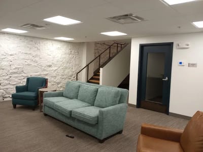 Interior common area with seating and stairs