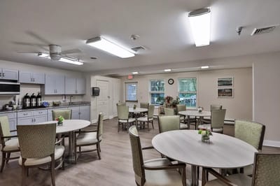 Bright dining room with tables and chairs