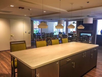 Bright common area with seating and natural light