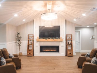 Cozy common area with seating and fireplace