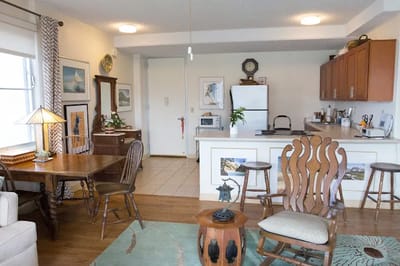 Cozy interior of a resident unit featuring a kitchen and dining space