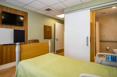 Interior view of a patient room in a healthcare facility