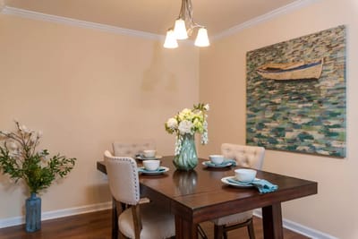 Cozy dining area with a table set for meals