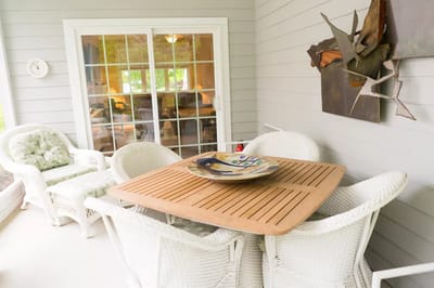 Outdoor seating area with wicker furniture