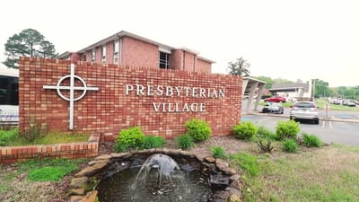 Facility logo and exterior sign at Presbyterian Village