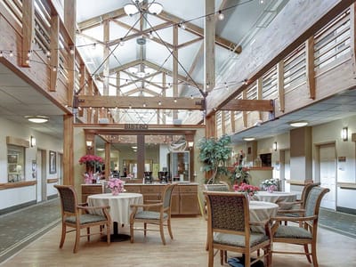 Interior view of a dining area with tables and chairs